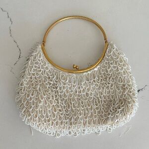 Elegant Cream Beaded Handbag with Gold Handle